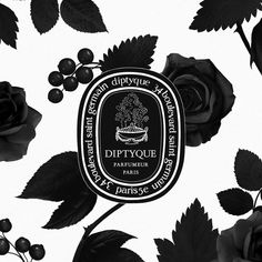 a black and white photo with roses, leaves and diptyquee logo on it