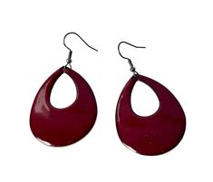 Large maroon statement earrings with oval hole (43mm x 32mm). I love this bold retro style and the glossy finish. Made by sifting layers of opaque arras red enamel onto high quality copper and firing several times at 830C in the kiln. Offered with a choice of brass effect, grey hypoallergenic or sterling silver ear wires.   These are handcrafted earrings and no two pairs are exactly the same.  Delivered in free (recyclable) presentation box.  Free standard UK postage.   www.etsy.com/shop/ArrowskyDesigns Red Enamel Earrings For Party, Red Enamel Trendy Earrings, Trendy Red Enamel Earrings, Handcrafted Earrings, Retro Stil, Style Retro, Ear Wires, Kiln, Retro Style