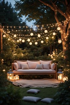 an outdoor seating area with lights and pillows