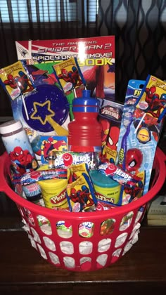 a red basket filled with lots of toys