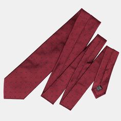 I named this tie after the beautiful city of Pisa, known for its rich history and timeless elegance. Just like Pisa’s enduring architecture, this woven jacquard tie in burgundy with navy blue polka dots brings a classic touch to your wardrobe. The polka dots are woven, not printed, ensuring they stay perfectly symmetrical—a mark of true quality. Whether you're attending a special occasion or just want to carry a bit of Pisa’s charm with you, this tie is the perfect choice. Details Standard Lengt Elegant Burgundy Suit And Tie Accessories For Business, Classic Burgundy Ties For Business, Classic Burgundy Suit And Tie Accessories For Formal Occasions, Classic Burgundy Suit And Tie Accessories For Business, Burgundy Standard Tie For Business, Burgundy Business Tie, Elegant Burgundy Tie For Formal Occasions, Classic Burgundy Ties For Formal Occasions, Formal Burgundy Standard Tie