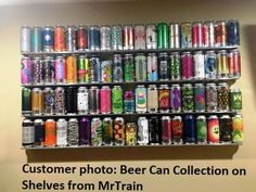 a shelf filled with lots of different types of cans and cans on it's sides