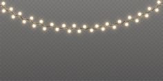 a string of christmas lights hanging from the ceiling in front of a gray wall with transparent background