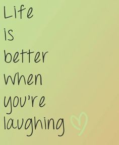 the words life is better when you're laughing are written on a green background