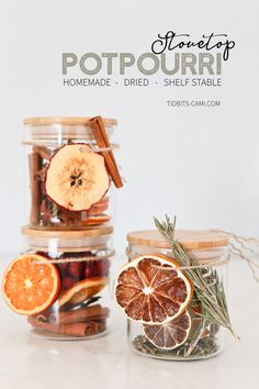 three jars filled with dried fruit and spices