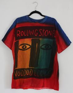 "Vintage Rolling Stones Voodoo Lounge T-shirt in Size XL. Condition: Great vintage condition.  ** Note that all of the items sold in my shop are vintage. This means that some items could be perfectly imperfect :-) Please don't hesitate to ask if you have any questions!! Size on label: XL  Material: 100% cotton  Measurements: Chest: 46\" Length: 30\" **Sizing is subjective some people like things worn loose and some like it tight. Please let me know if you have any questions regarding this. Some vintage tags have the size written on them remember that these are vintage pieces and there is no universal size chart.  **Returns: There are no returns on items, all items are sold as is**" Rock And Roll T Shirts Vintage, Tee Shirt Rolling Stones, The Rolling Stones Shirts, Cotton Rock And Roll Graphic T-shirt, Unisex Cotton Rock And Roll T-shirt, Burberry Scarf, Vintage Burberry, Write To Me, Perfectly Imperfect