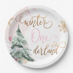 a paper plate with a christmas tree on it and the words winter onederland