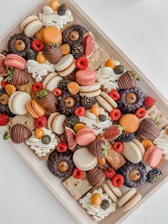 a tray filled with lots of different types of pastries