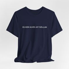 A funny Icelandic saying printed on a comfy t-shirt. Translated to English: " I come completely from the mountains." Meaning you have no idea what people are talking about. It also refers to when you feel out of the loop and don't know what is going on.  Available in different colors!  Made with 100% Airlume combed and ring-spun cotton, a lightweight fabric (4.2 oz/yd² (142 g/m that is easy to layer, breathable. Perfect for active and leisure wear. Band Merch Crew Neck T-shirt With Text Print, Band Merch T-shirt With Text Print And Crew Neck, Band Merch Crew Neck T-shirt With Funny Text, Funny Text Graphic Cotton T-shirt, Funny Text Crew Neck T-shirt In Ring-spun Cotton, Funny Text Print T-shirt In Ring-spun Cotton, Cotton Graphic Tee With Funny Text, Funny Slogan Tops In Ring-spun Cotton, Band Merch T-shirt In Ring-spun Cotton With Slogan