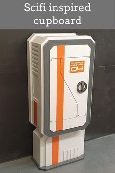 an orange and white machine with the words scifi inspired cupboard on it's side