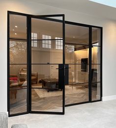 an open living room with sliding glass doors