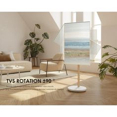 a living room with white walls and wooden flooring is featured in this ad for tv rottation