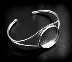 Product Details :- 925 Sterling Silver Bangle Bezel Setting Cup Back Side :- Close Shape - Round Material :- Only Pure 925 Sterling Silver Shipping :- * More then 35$ order value goods automatically converted into free shipping for US buyers only, * Delivery by normal courier will take 15-25 days * If any buyer need items more fast, Then message me for EXPRESS DELIVERY. Silver Bracelet With Bezel Setting For Anniversary, Silver Sterling Silver Cuff Bracelet With Cabochon, Silver Bracelets With Bezel Setting For Anniversary, Adjustable Round Bangle For Anniversary, Silver Cabochon Cuff Bracelet Gift, Adjustable White Gold Bangle, Adjustable Round Anniversary Bangle, Classic Nickel-free Round Bangle, Round Bangle With Bezel Setting As Gift