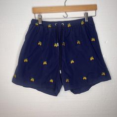 Francesco Casola Vintage Navy Blue Yellow Lemon Embroidered Swim Shorts large excellent pre owned condition drawstring, elastic waist, mesh lining, pockets >> 100% polyester >> size large >> waist 30" >> inseam 4" >> rise 10" All measurements are approximate. Please check the measurements, vintage and pre owned items vary in size. I identify all known flaws, please note the pictures as additional description to the condition. I ship within 24 hours, except on Sunday. Questions are welcomed. Casual Nylon Bottoms For Beach Season, Casual Spring Bottoms For Pool, Casual Embroidered Blue Shorts, Navy Bottoms For Pool And Summer, Blue Drawstring Bottoms For Vacation, Blue Cotton Swim Trunks With Drawstring, Navy Casual Swim Trunks With Elastic Waistband, Navy Drawstring Bottoms For Beach, Navy Nylon Shorts For Summer