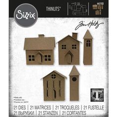 four cardboard houses are shown in three different sizes