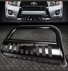 the front bumper and grille of a silver toyota truck