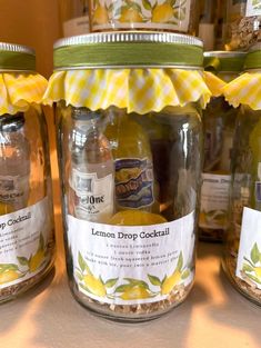 jars with lemon drop cocktails are on display