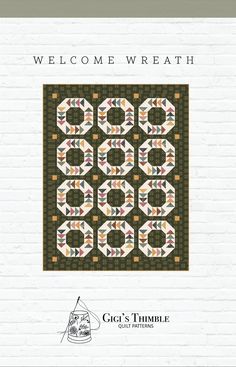 the cover of a quilt book with an image of numbers and letters on it, which are