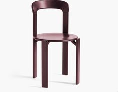 a purple plastic chair on a white background