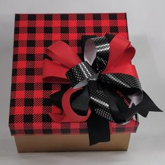 a red and black box with a bow on it