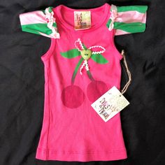 Adorable Twirls And Twigs Cherry Tank Top Playful Pink Tops For Babies, Fun Pink Tops For Spring, Playful Pink Summer Top, Pink Tops For Playwear In Spring, Playful Pink Summer Tops, Cute Pink Tops For Playwear, Pink Spring Tops For Playtime, Pink Summer Top For Play, Pink Cotton Top For Play