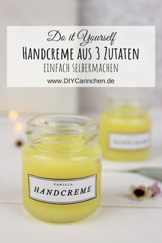 two jars of handcreme are sitting on a table