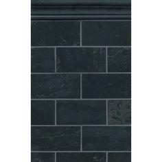 a black brick wall that has been made out of dark colored tiles and is in the shape of a rectangle