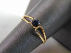 A WOMEN'S VINTAGE ESTATE 14K GOLD BLUE SPINEL RING THAT WEIGHS 1.2g. THE RING SIZE IS AN 8.0, AND THE STONE IS ABOUT .15cts. RING IS MARKED 14K. ANY QUESTIONS PLEASE DONT HESITATE TO ASK. BE SURE TO CHECK OUT SOME OF MY OTHER GREAT ITEMS UP FOR SALE. THANK YOU. Formal Blue Birthstone Ring In 14k Gold, Dainty Blue Ring For Formal Occasions, Dainty Sapphire Solitaire Ring For Formal Occasions, Formal Sapphire Birthstone Ring In 14k Gold, Dainty Sapphire Ring For Formal Occasions, Formal 14k Gold Sapphire Birthstone Ring, Formal Dainty Sapphire Ring, Dainty Hallmarked Birthstone Ring For Formal Occasions, Silver Turtle Ring