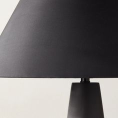 a black lamp on a white background