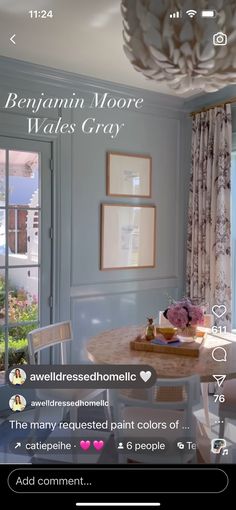 an image of a dining room with blue walls