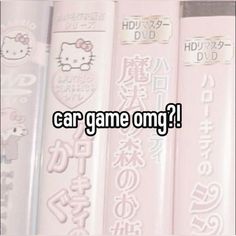 the words car game omg are written in japanese characters on pink and white books