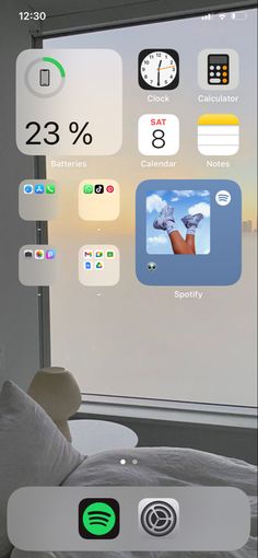 an image of a bedroom with various app icons on the wall and in the window