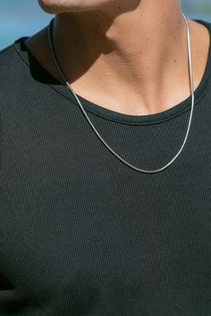 A staple, stainless steel snake chain. Part of our new Men's Collection, but designed to be gender inclusive, it's sure to become as valuable as your favorite white tee.James is wearing the 24" inch length chain.✦ DETAILS ✦✧ Name: Likeke (lee-KEH-keh) - courageous ruler.✧ Thickness: 3mm.✧ Stainless Steel.✧ All Ke Aloha Jewelry pieces come packaged thoughtfully, beautifully, and ready for gift giving.✧ Unless otherwise noted in the listing description, all pieces are sold individually. Photos wit Silver Snake Chain Necklace For Everyday, Everyday Silver Snake Chain Necklace, White Gold Chain For Men, Men With Chains, Silver Chain Design For Men, Guy Jewelry, Mens Chains, Men Jewellery, Men Chain