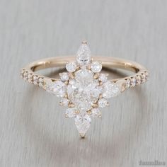 an engagement ring with two pear shaped diamonds