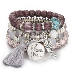 Four piece love wings charm cuff bracelet. A beautiful design combination of multiple bead types. Available in 5 different colors. Details Item Type: Fashion Bracelets Metal Type: Zinc Alloy Material: Wood,Bead,Cotton,Crystal Stile Boho Chic, Casual Bracelets, Tassel Bracelet, Bracelet Online, Love Charms, Stackable Bracelets, Opal Crystal, Beaded Tassels, Natural Opal