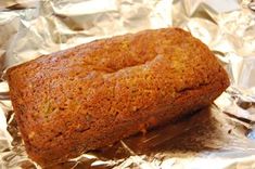 a loaf of bread sitting on top of aluminum foil