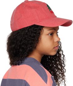 Cotton twill cap in red. · Embroidered eyelets at crown · Graphic and text embroidered at face · Curved brim · Cinch fastening at back face · Plain-woven browband Supplier color: Red Jellymallow Size: Head Circumference Uni: 21.3 / 54 cm Red Embroidered Baseball Cap, Red Embroidered Baseball Cap With Curved Brim, Red Cotton Hat With Embroidered Logo, Red Cotton Visor Baseball Cap, Red Cotton Baseball Cap, Red Cotton Dad Hat With Embroidered Logo, Red Cotton Baseball Cap With Embroidered Logo, Red Embroidered Cotton Hat, Cotton Twill