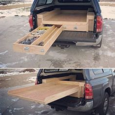 the back end of a truck with two open drawers on it's bed and one opened