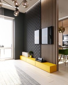 a modern living room with black and yellow accents