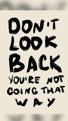 the words don't look back you're not going that way are black and white