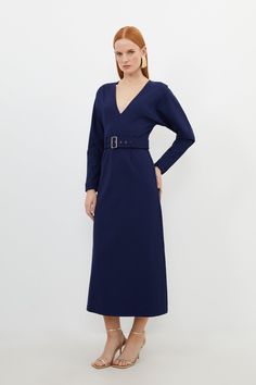 Experience Elevation In Your Every Day Wardrobe With Our Midi Dress, Featuring A Flared Silhouette That Flatters The Curves, With A Belted Waistline To Cinch The Silhouette, And A Plunging V Neckline. Style It With Block Heels Or Loafers For A Casual Approach, Then Strappy Stilettos For An Occasion Look. Ponte Belted Midi Dress High Quality Ponte Fabric Flattering Fit And Flare Silhouette Cinched, Belted Waistline Deep V Neckline Zip Back Fastening Cocktail V-neck Belted Mini Dress, Belted V-neck Midi Dress, V-neck Belted Midi Dress For Office, Fitted V-neck Long Sleeve Dress For Work, Chic Belted Midi V-neck Dress, Chic Belted V-neck Midi Dress, Fitted V-neck Belted Dress For Spring, V-neck Belted Midi Dress For Date Night, Chic V-neck Belted Dress For Fall