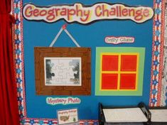 a classroom display with red curtains and blue walls