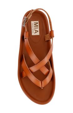 Smooth and slender straps weave into one another on this paradise-ready sandal set atop a cushioned footbed. 1" platform Adjustable ankle strap with buckle closure Cushioned footbed Synthetic upper, lining and sole Imported Vacation Strappy Slingback Sandals, Leather Strappy Footbed Sandals For Vacation, Brown Slingback Sandals With Heel Strap For Vacation, Brown Heel Strap Slingback Sandals For Vacation, Leather Strappy Footbed Sandals, Leather Slingback Sandals With Braided Straps For Summer, Adjustable Strappy Slingback Sandals With Cushioned Footbed, Brown Adjustable Footbed Sandals, Adjustable Brown Footbed Sandals