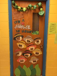 a door decorated with hats and ribbons