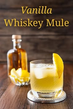 an old fashioned whiskey mule is garnished with a slice of lemon