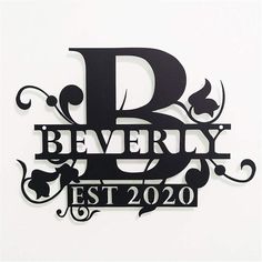 a metal sign that says beverly est 2020