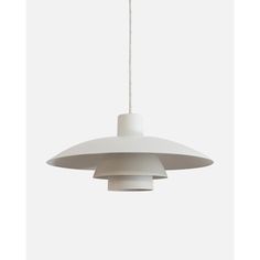 a white light hanging from a ceiling fixture