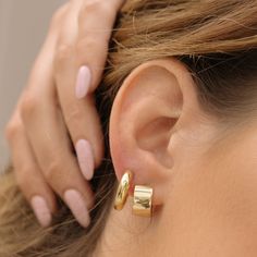 A modern take on your classic hoop. These hoops are lightweight making everyday wear a breeze. Sold as a pair (2) - Made in gold vermeil: a thick 18k gold layer on 925 sterling silver.- Inner diameter: 10mm- Outer diameter: 13.8mm- Earring thickness: 7.8mm- Waterproof, tarnish resistant & hypoallergenic Modern Gold Huggie Earrings For Everyday, Modern 14k Gold Filled Tarnish Resistant Huggie Earrings, Modern 14k Gold Filled Tarnish-resistant Huggie Earrings, Free Giveaway, Gold Vermeil, Pear, Layering, Everyday Wear, 18k Gold