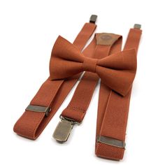 "Burnt orange suspenders Set, Groomsmen suspenders, Ring Bearer, Wedding Suspenders, Suspenders Men, Groom Suspenders, Suspenders For Men Welcome to Justformanboutique! Note: Please add your bow tie style preference as order note. → Item: Burnt Orange Bowtie and Burnt Orange Suspenders Set Burnt orange suspenders Set, Burnt Orange bow tie, Wedding bow tie, Groom bow tie, Ring bearer, Bow Tie for men, Groom suspenders → SUSPENDERS; Adjustable from 16\" to 27\". Y-back suspenders of high quality e Classic Brown Belts And Suspenders For Wedding, Brown Suspenders Wedding, Fall Wedding Suspenders Bow Ties, Orange Bow Tie Wedding, Burnt Orange Bow Tie And Suspenders, Groom Suspenders, Groomsmen Suspenders, Groom Bowtie, Suspenders Wedding