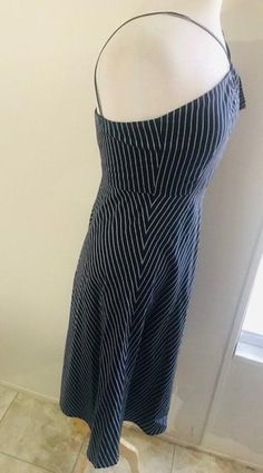 "J Crew Striped Dress, Vintage Navy Blue and White Striped Dress, Fit and Flare Dress, Size 2 Lovely striped skater dress! The color is navy blue and white. Open and close with invisible zipper on the side. The manikin is very big for the size of the dress! This dress is super pretty to wear during spring and summer. In great condition armpit to armpit around: 30\" waist: 30\" length: 34\" Genesis Vintage Shop accept returns and Exchanges! Joy and satisfaction with your item is very important to Striped Lined Sundress, Striped Sundress With Lining, Striped A-line Lined Dress, Striped Midi Sundress, Pinstripe Sleeveless Spring Dress, Spring Pinstripe Sleeveless Dress, Pinstripe Sleeveless Dress For Spring, Spring Striped A-line Midi Dress, Fitted Striped Midi Dress